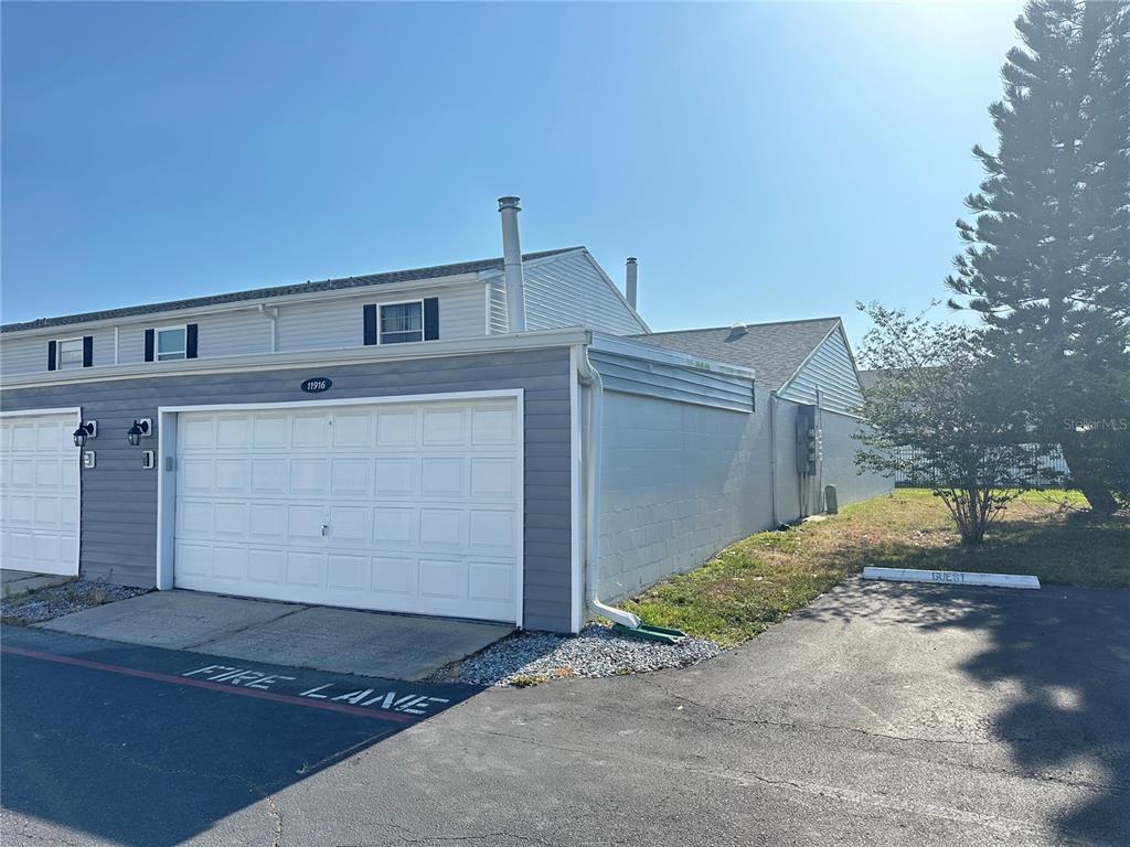 a front view of a house with a garage