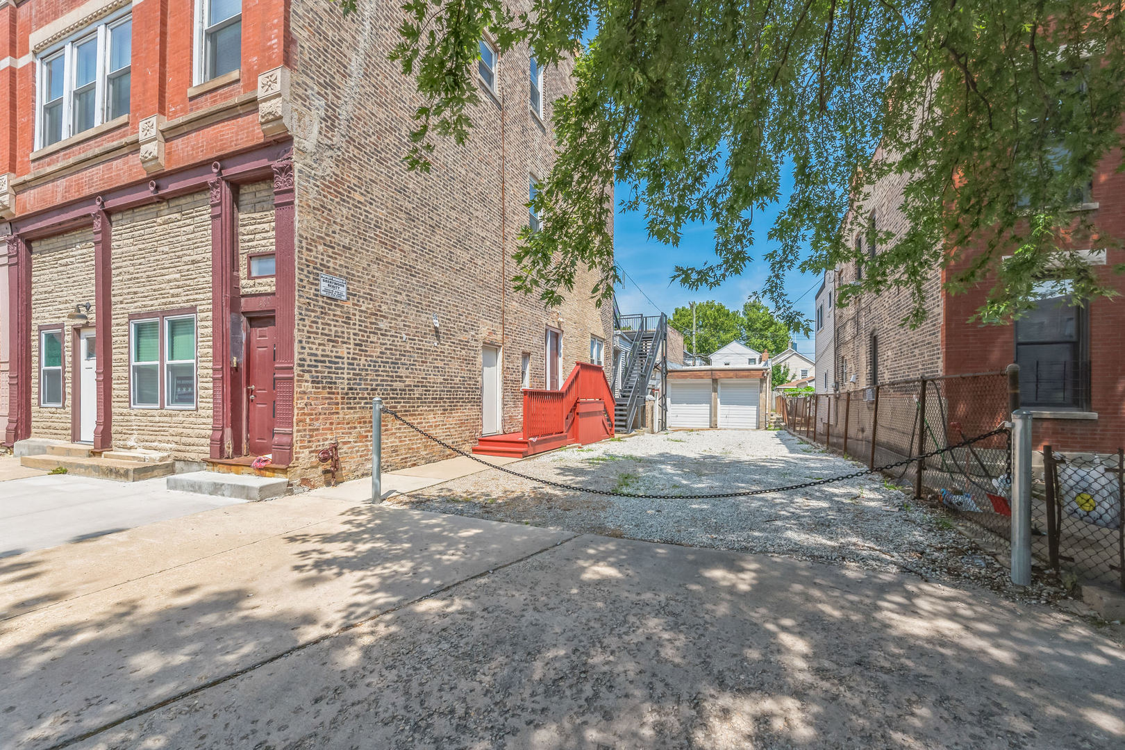 a view of a brick house with a street