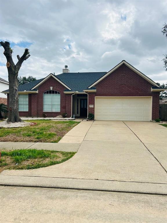 a house with yard in front of it