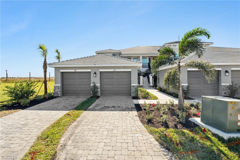 View of front of property with a garage