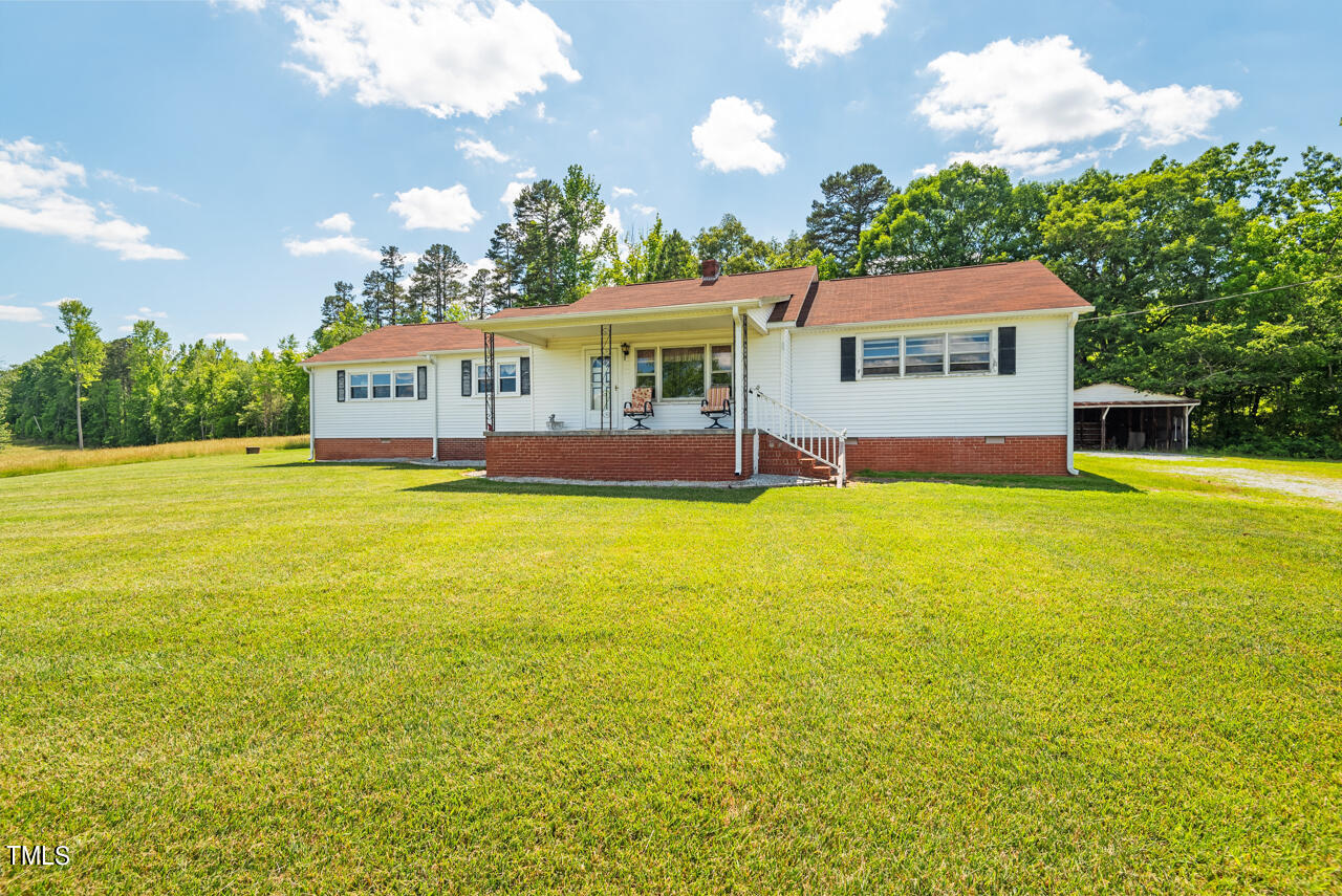 a view of a house with a big yard