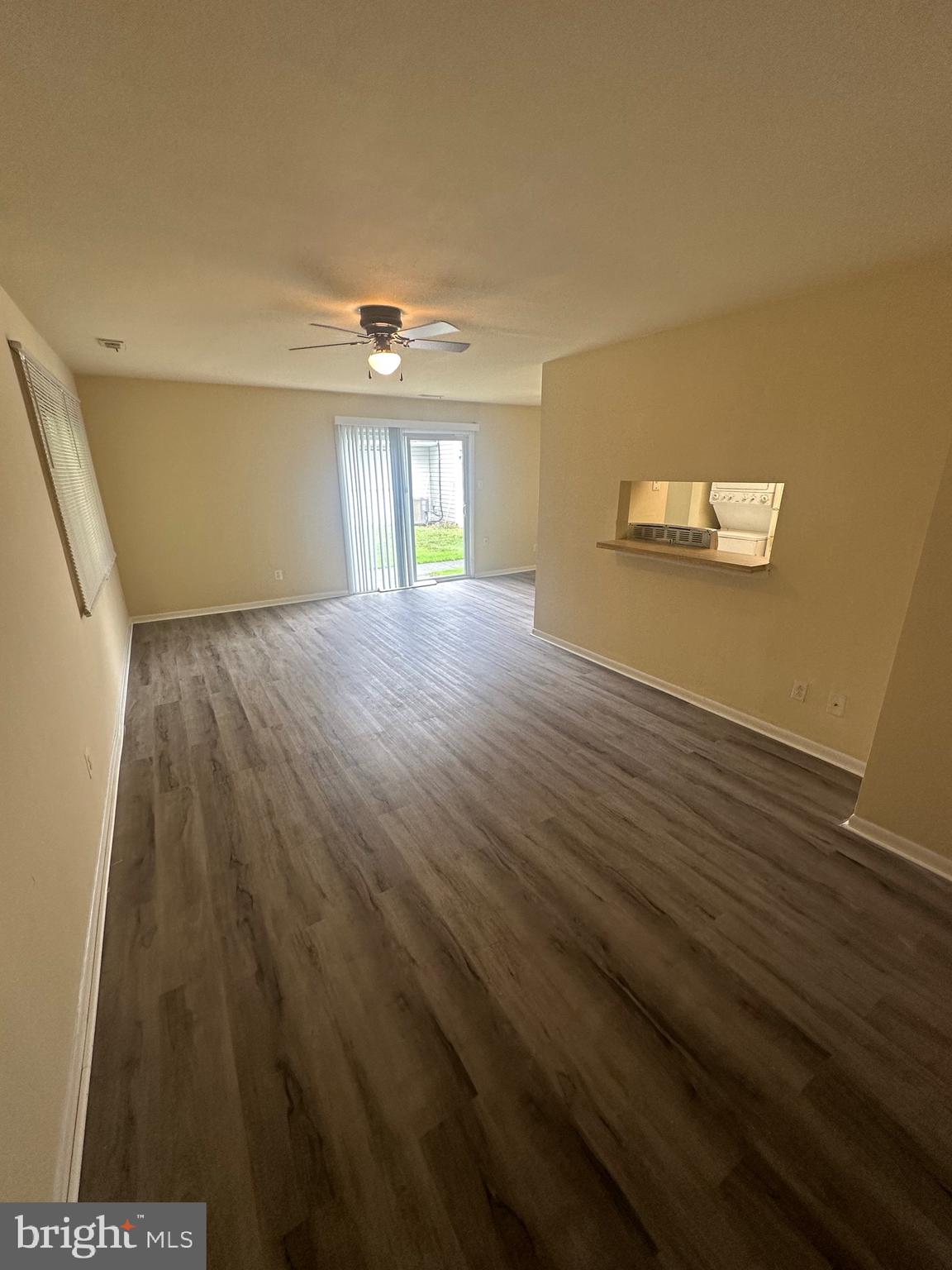 a view of livingroom with hardwood and window