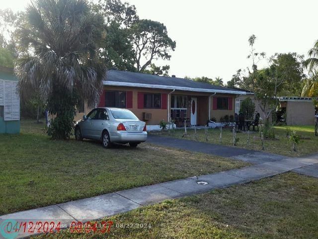 a car parked in front of a house