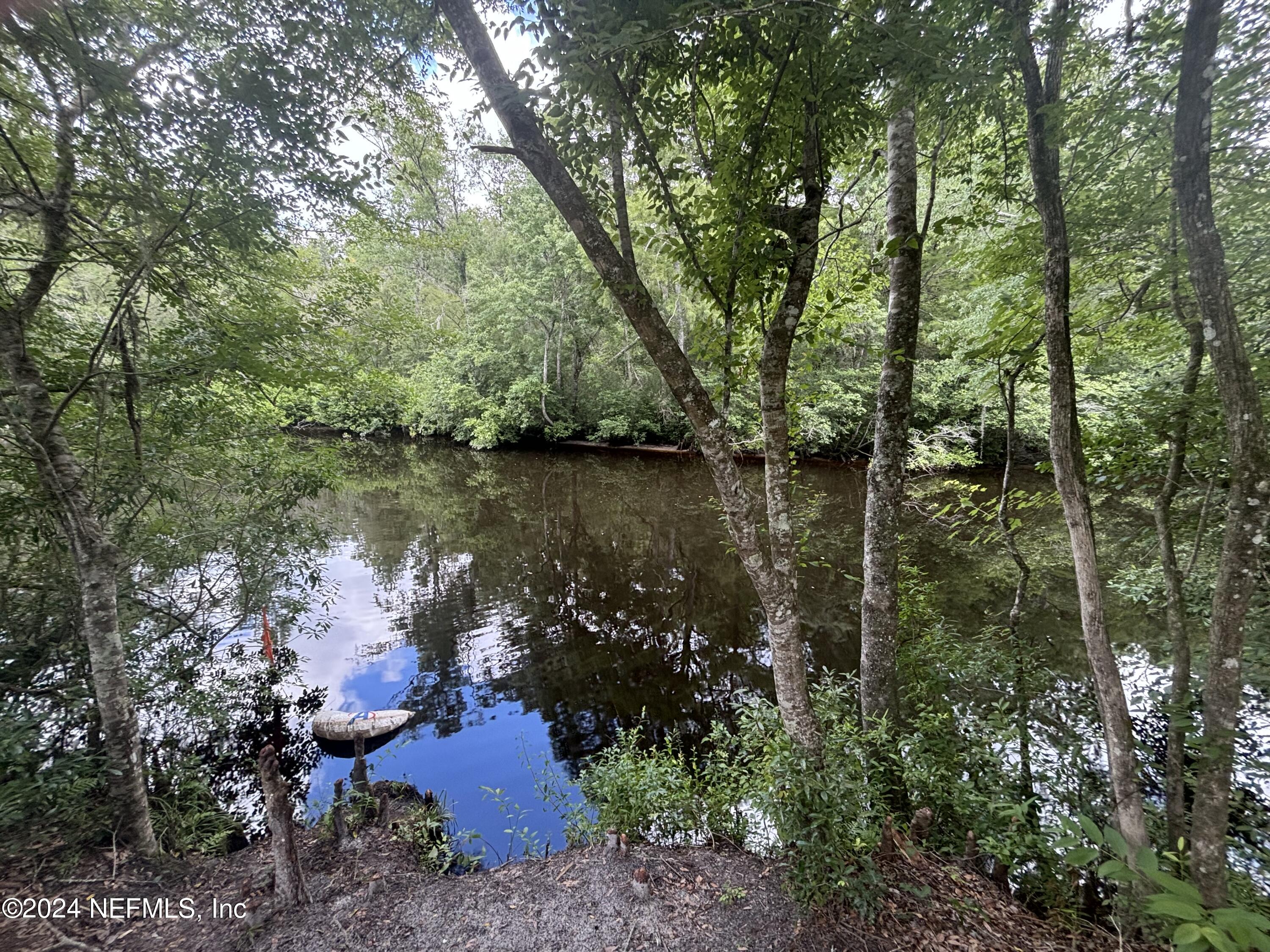 a lake view with sitting space