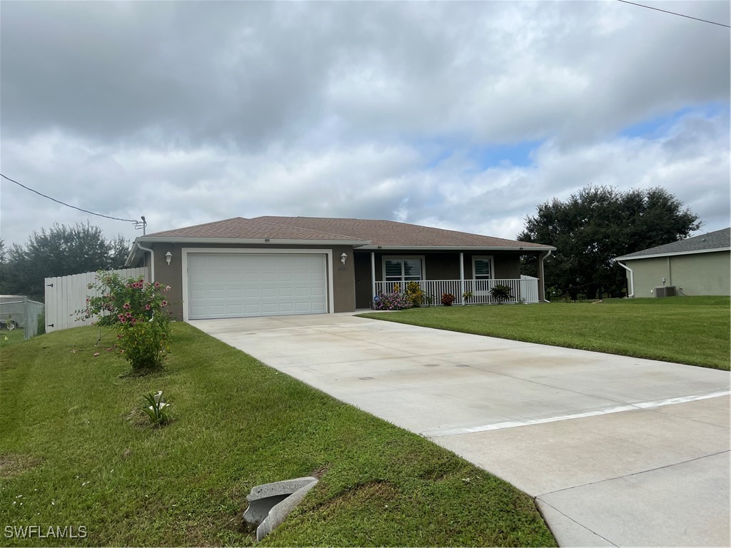 front view of a house with a yard