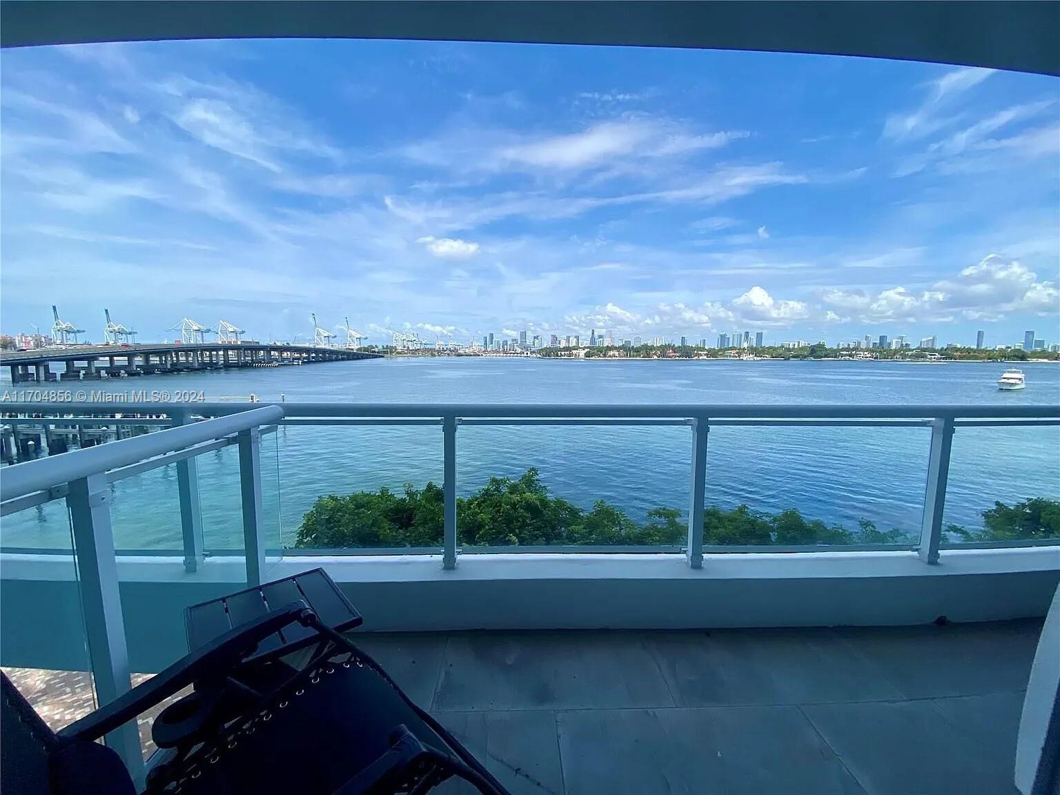 a view of a city skyline from a balcony