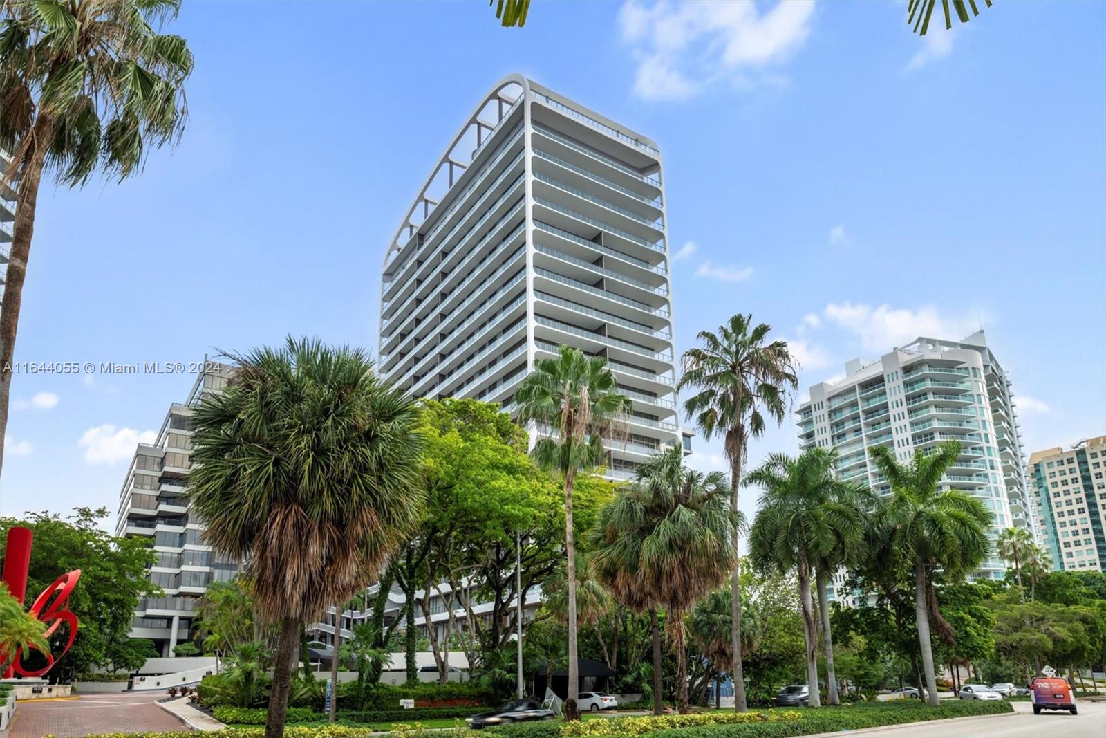 a view of a tall white building