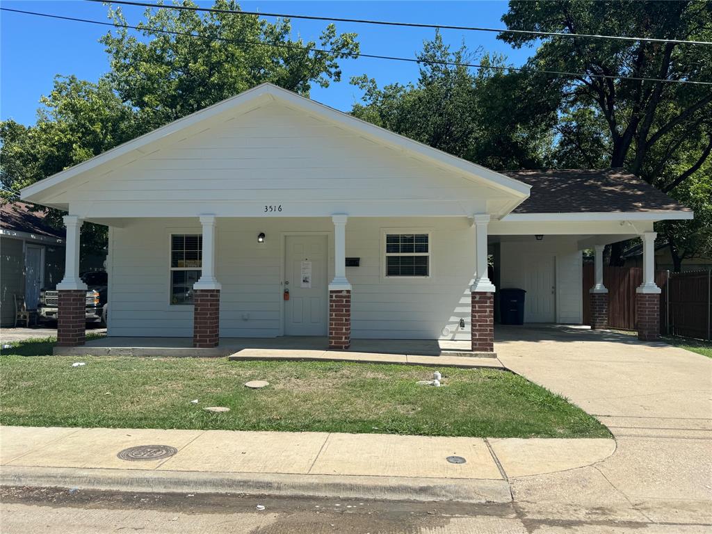 a front view of house with yard