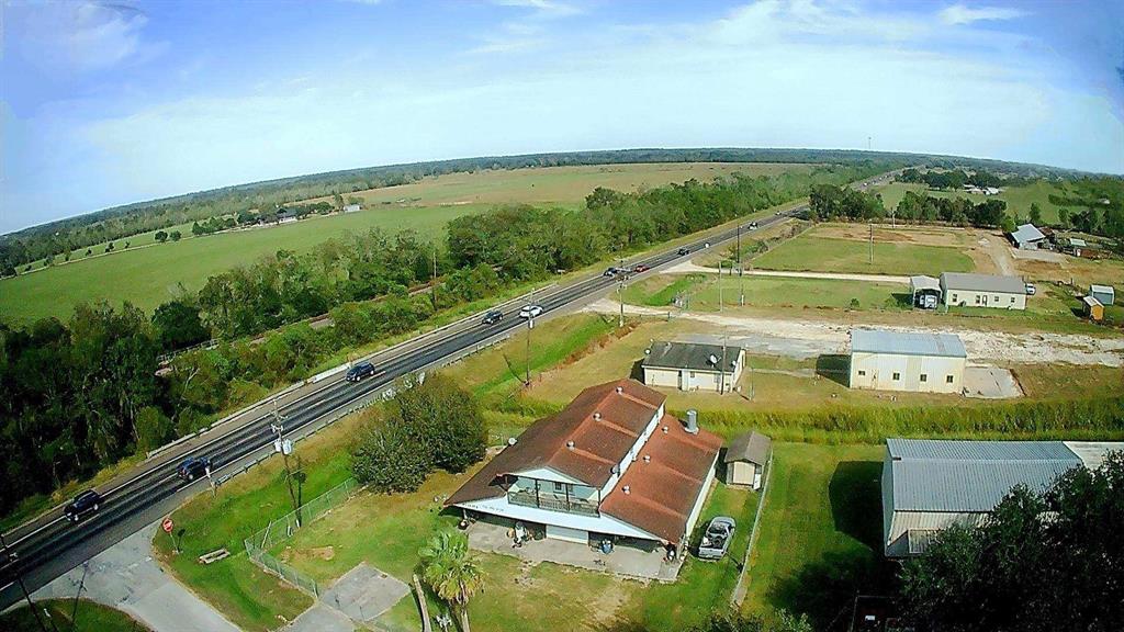 a view of a swimming pool with a yard