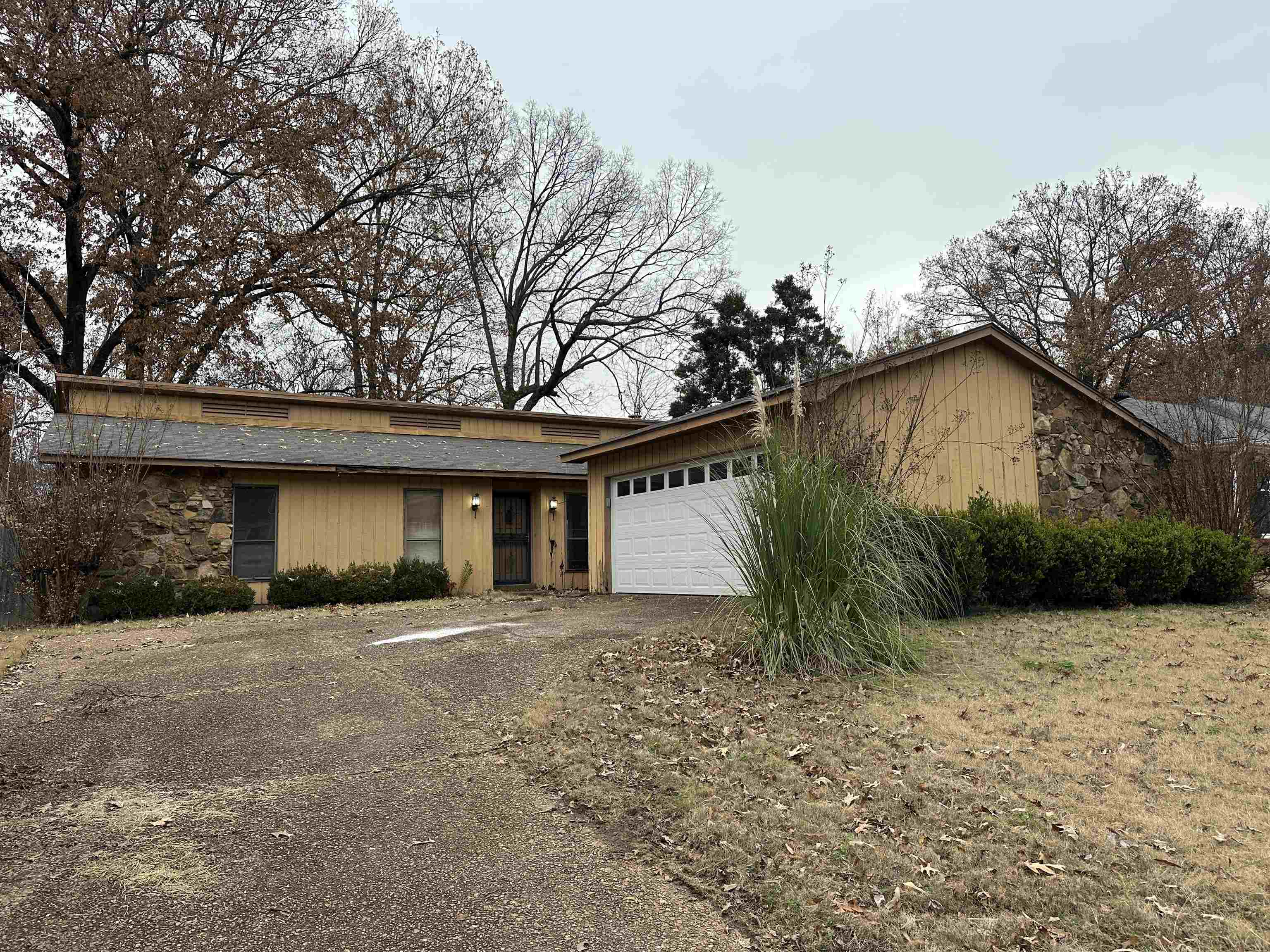 Single story home with a garage