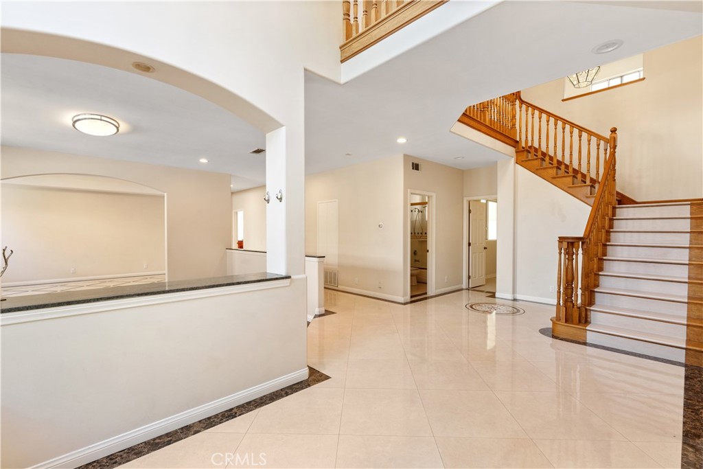 a view of a hallway with staircase