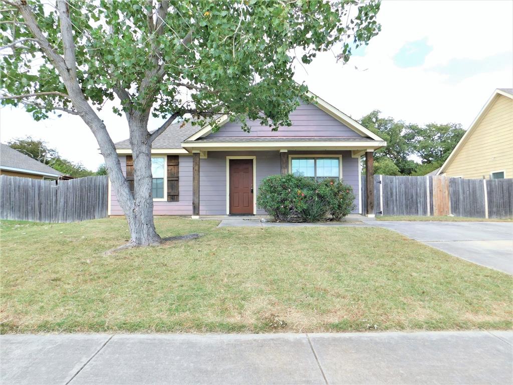 a house with trees in front of it