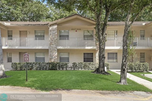 $249,999 | 8317 Royal Palm Boulevard, Unit 104 | Forest Hills