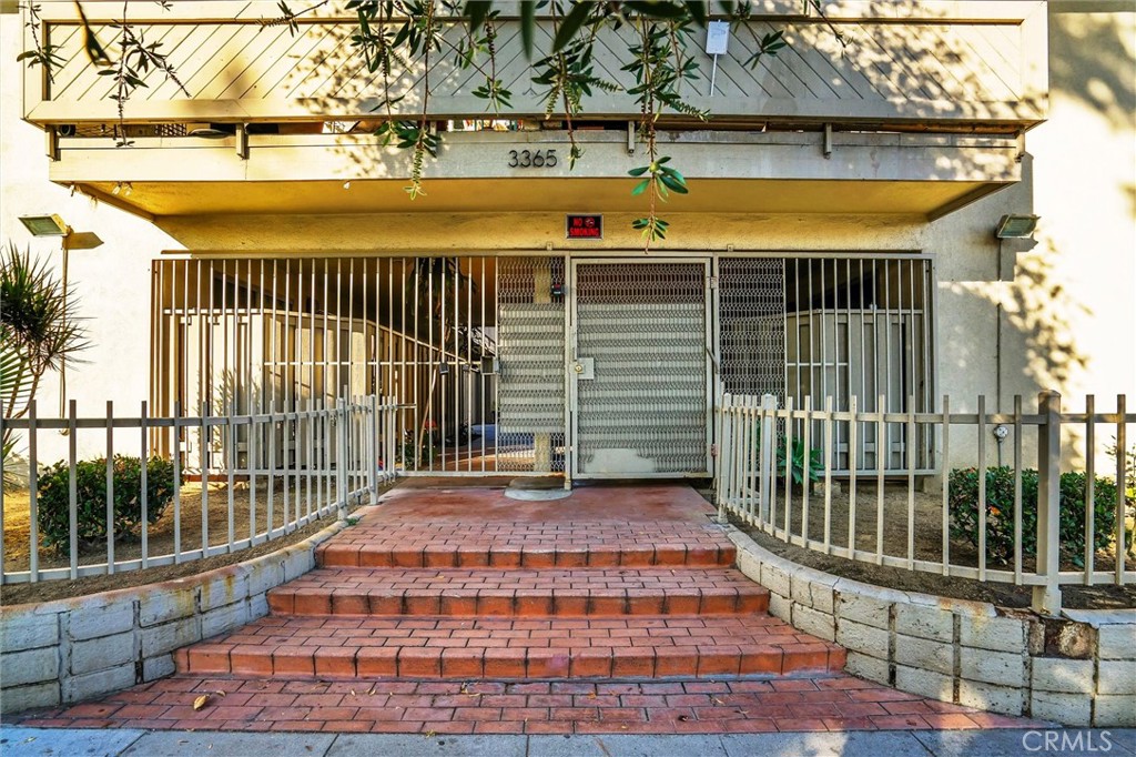 a view of a balcony with wooden floor