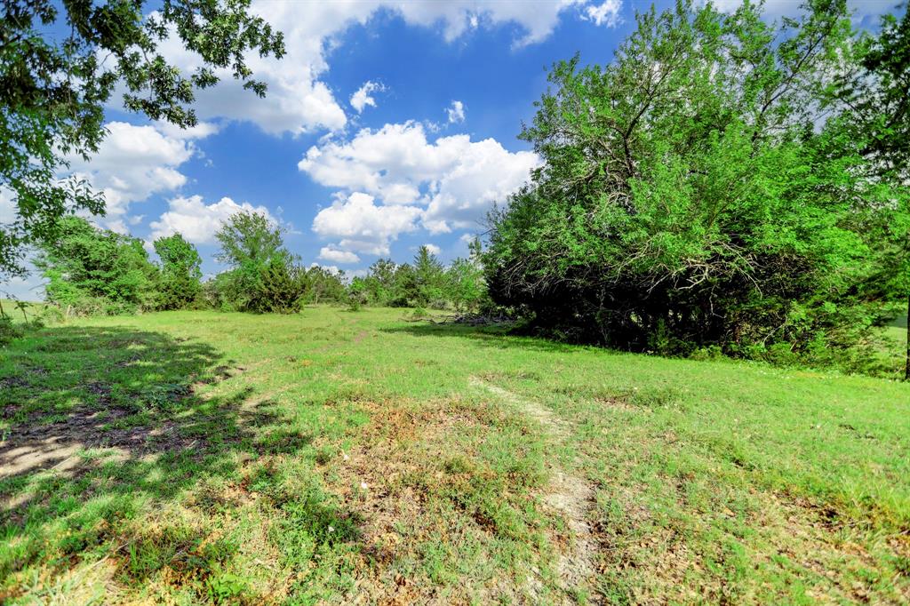 Beautiful country property down a private road off of CR208...this great property is located just over an hour from Houston and within 30 minutes of College Station