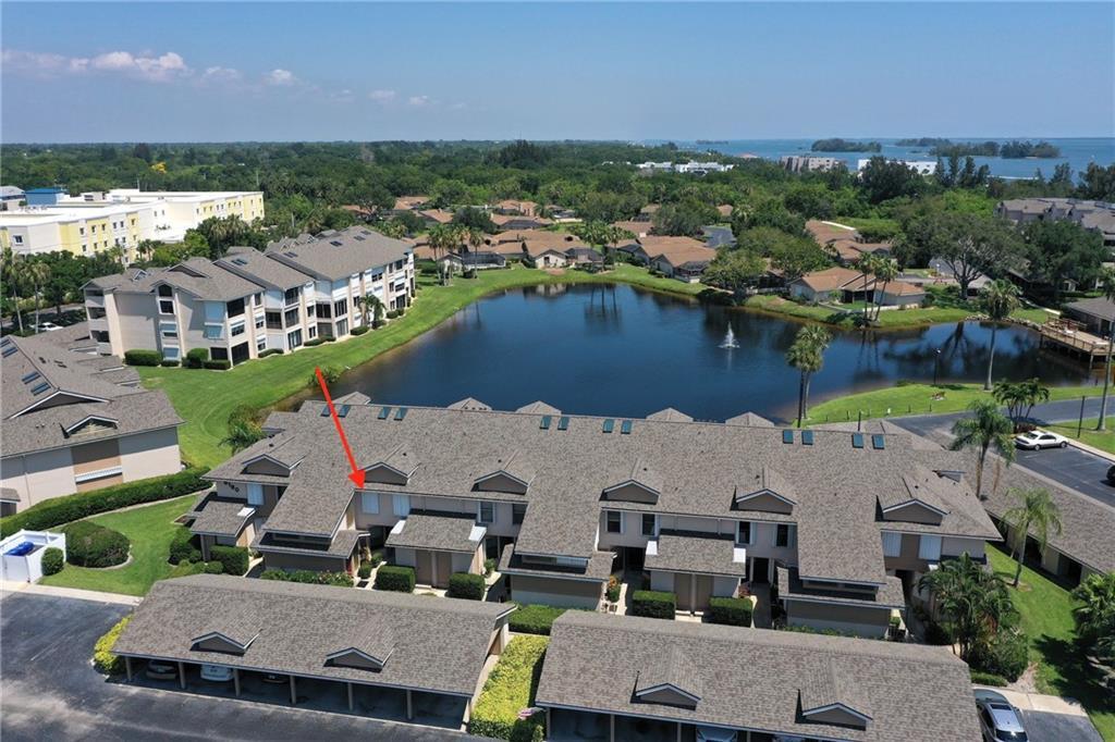 an aerial view of residential houses and outdoor space