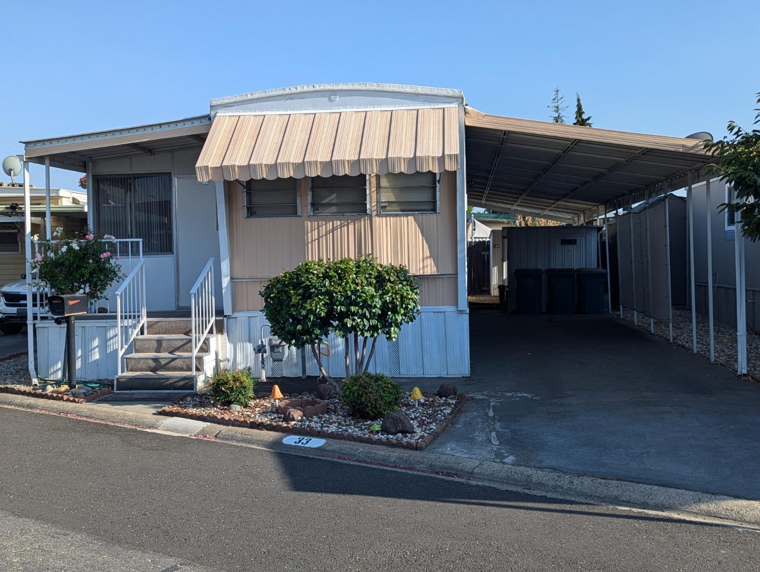 a front view of a house with a garage