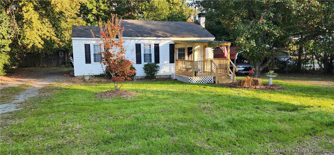 front view of a house with a yard