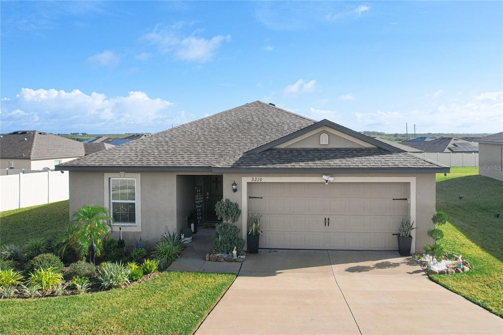 a front view of house with yard