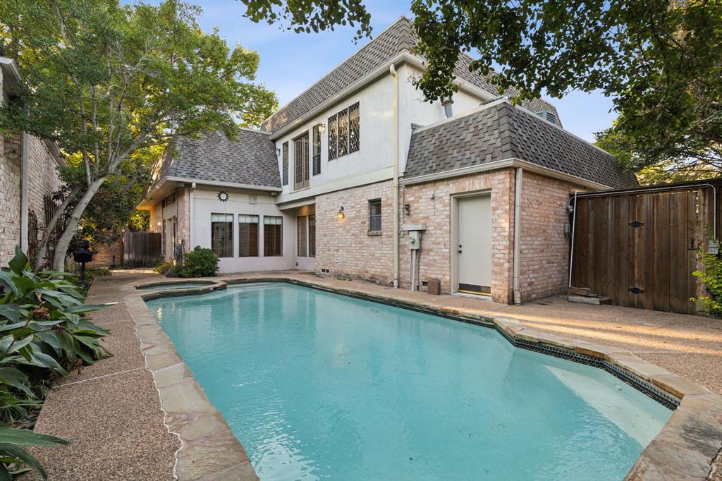 a front view of a house with swimming pool