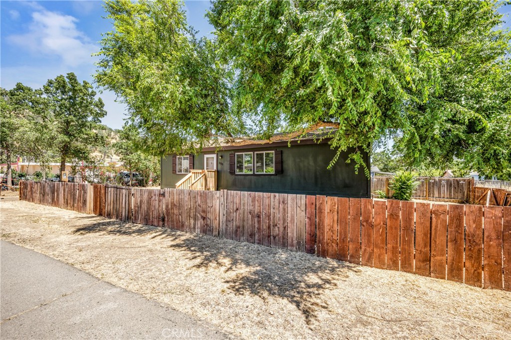 a view of a wooden fence