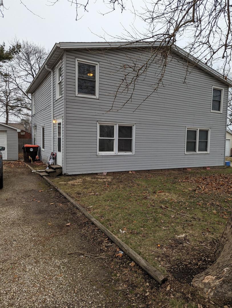 a front view of house with yard