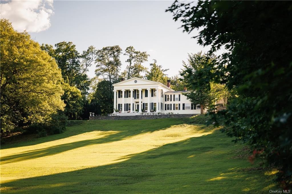 a view of a house with a swimming pool