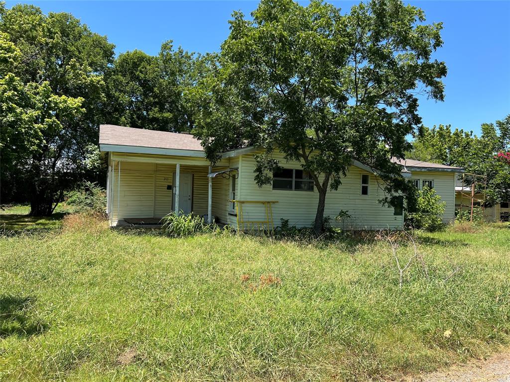 front view of house with a yard