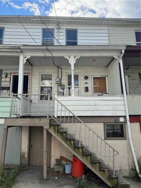 a view of a house with a balcony