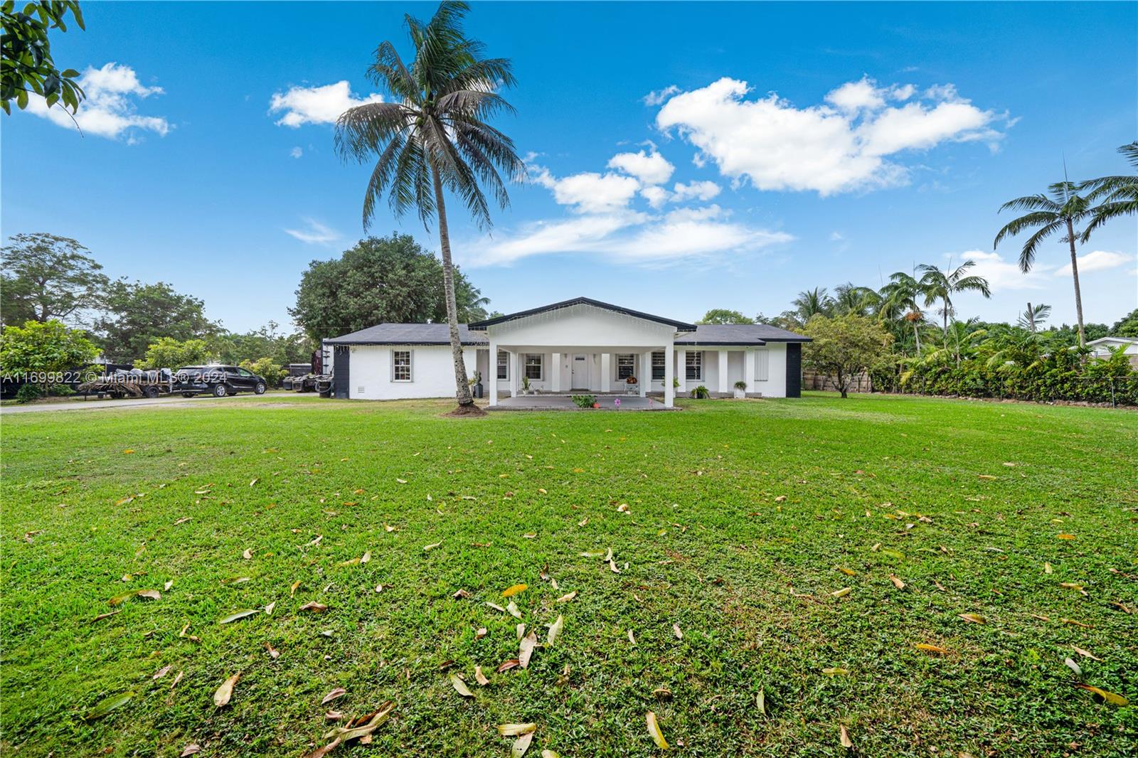 a view of a house with a big yard