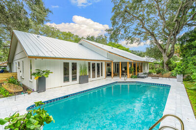 a view of a house with a swimming pool