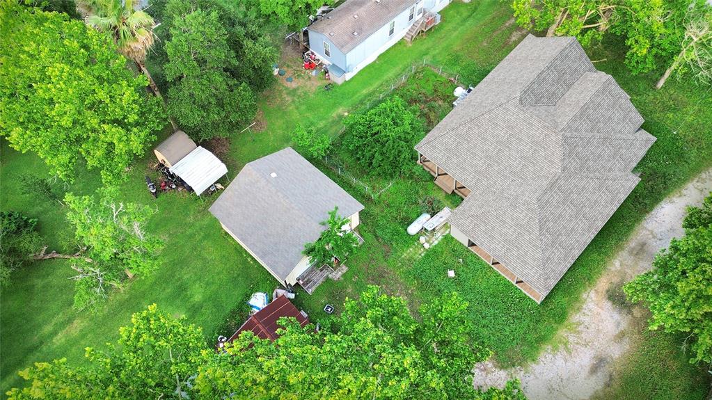 Aerial View and Rendering of Lot with House.