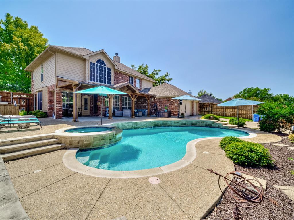 a view of a house with a swimming pool