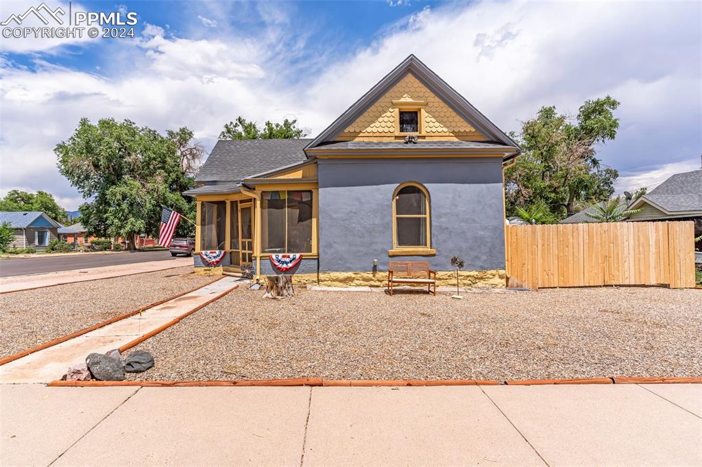 front view of a house with a yard