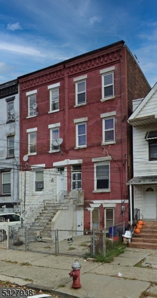 a front view of a building with street