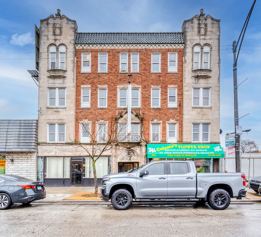 a car parked in front of a building