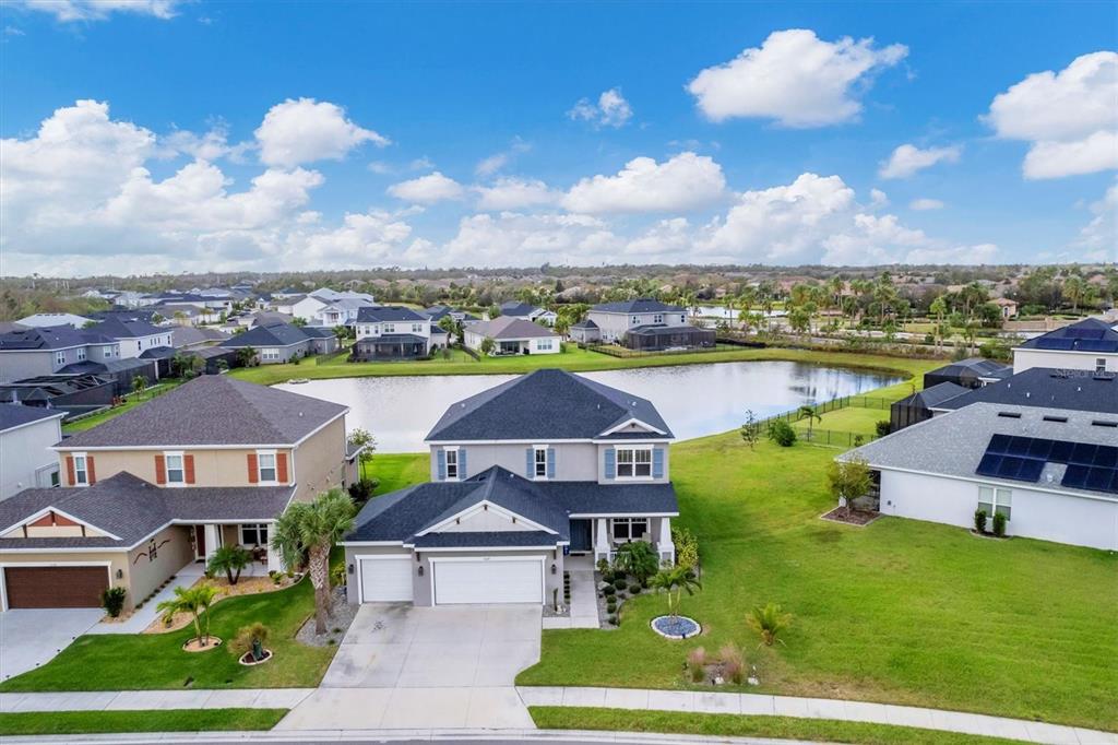 an aerial view of a house with a garden