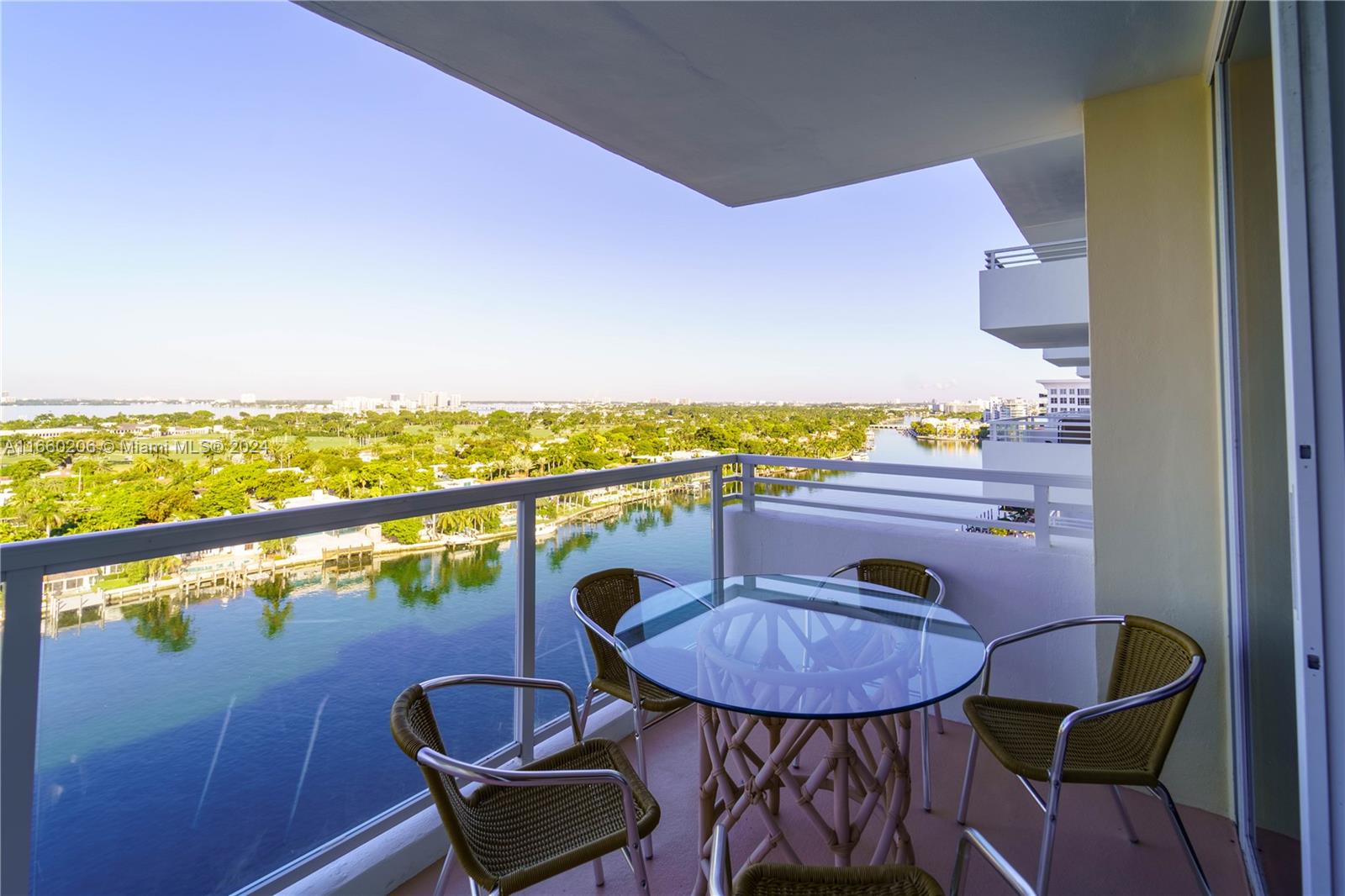 a view of a chairs and table in patio