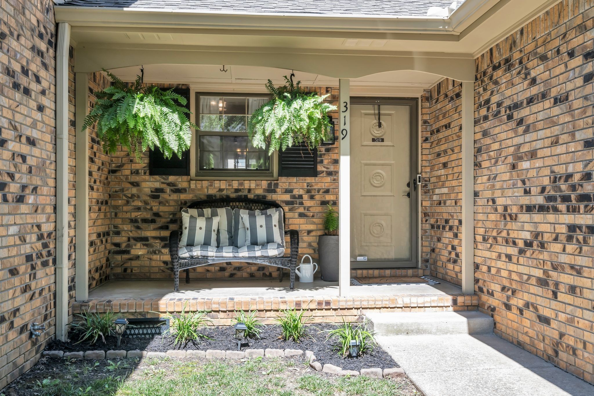 Front porch sitting!!! Enjoy your coffee in the morning here OR on your private back porch.