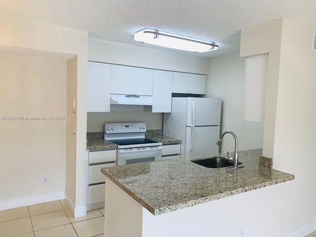 $320,000 | 10477 Northwest 7th Street, Unit 104 | Pembroke Pointe