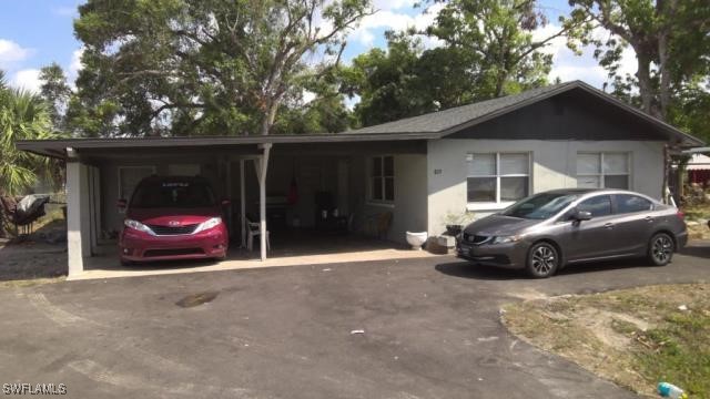 a car parked in front of house