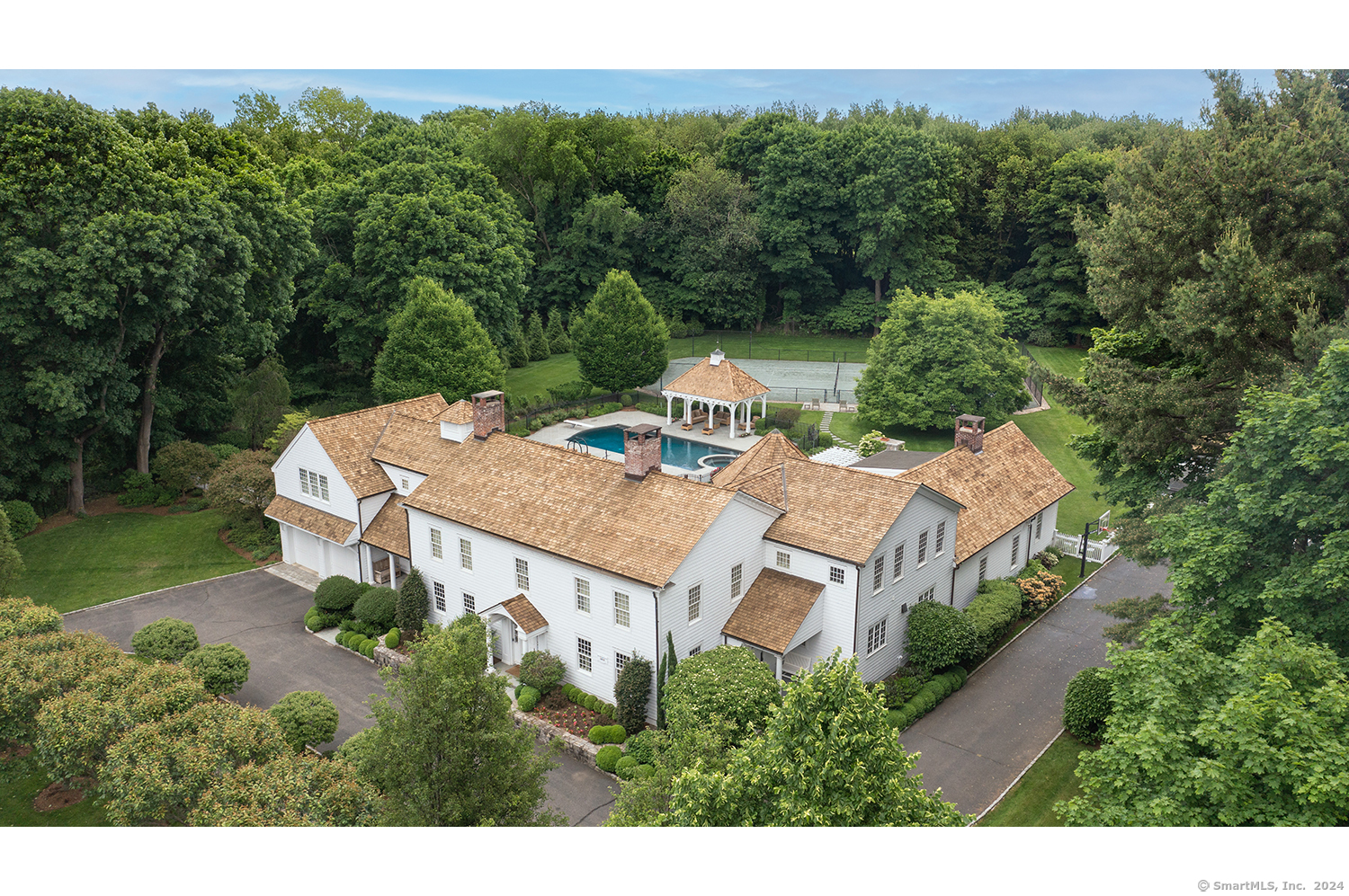 a aerial view of a house with a yard