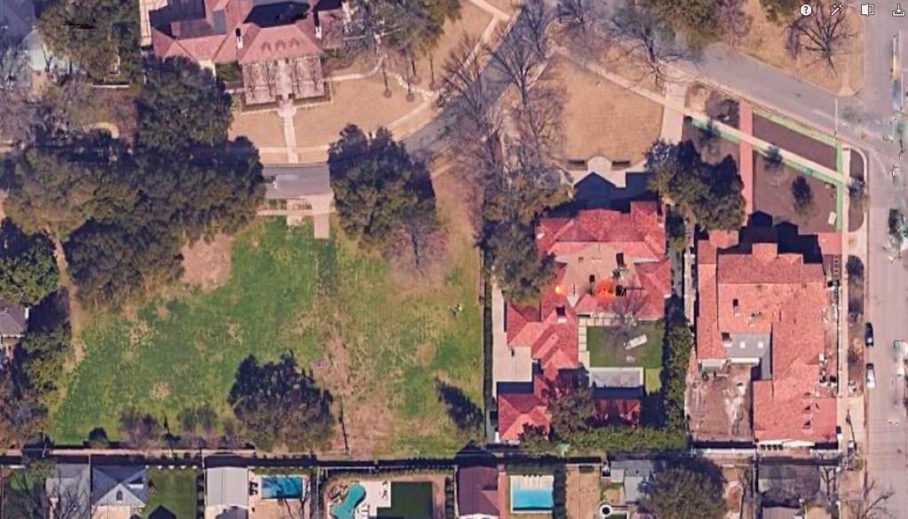 an aerial view of waterside residential houses with outdoor space