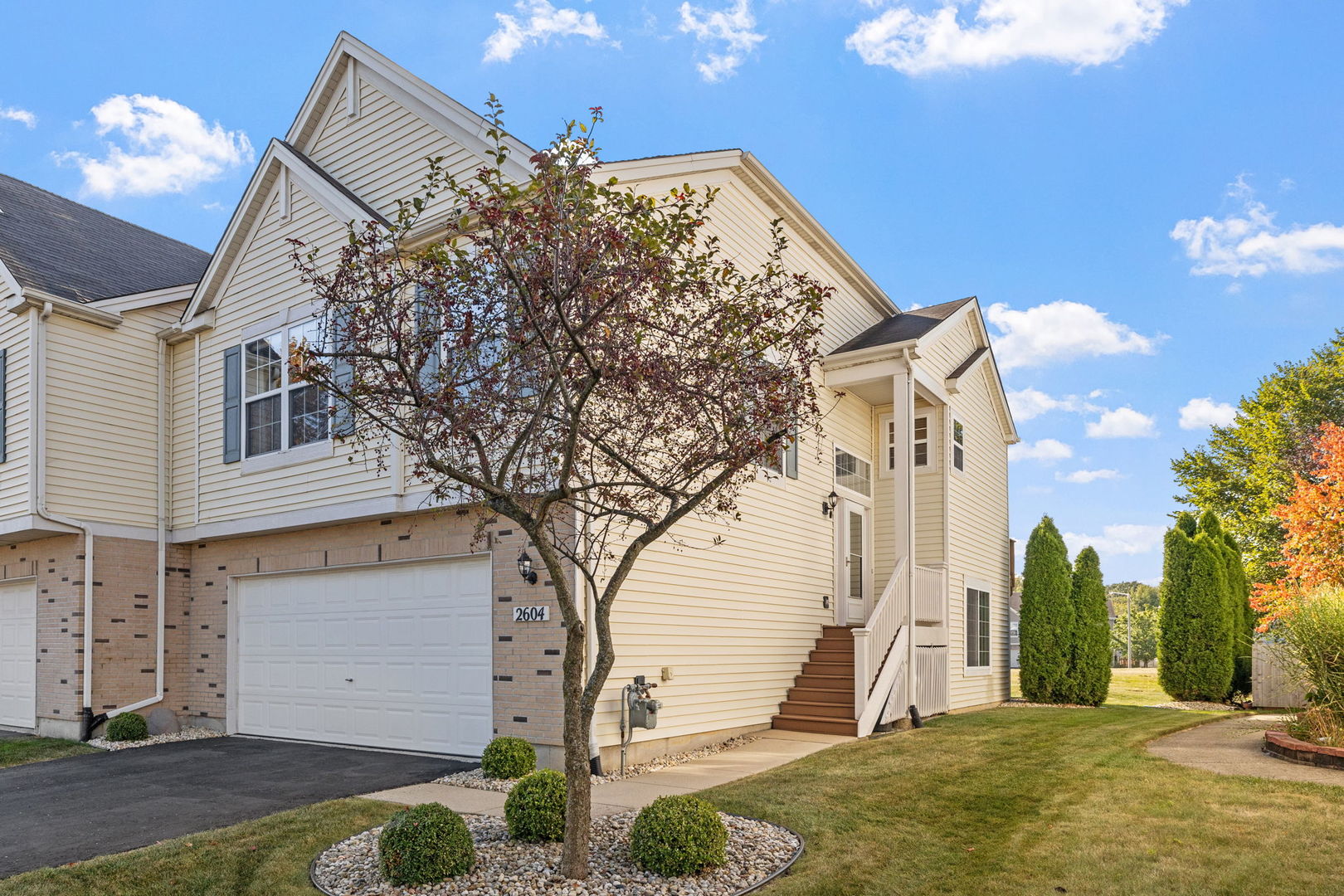 a view of a house with a yard