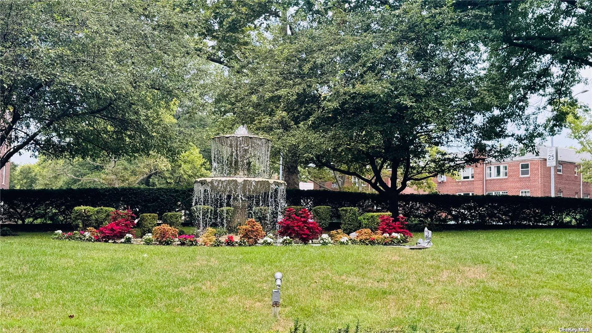 a group of people sitting in a park