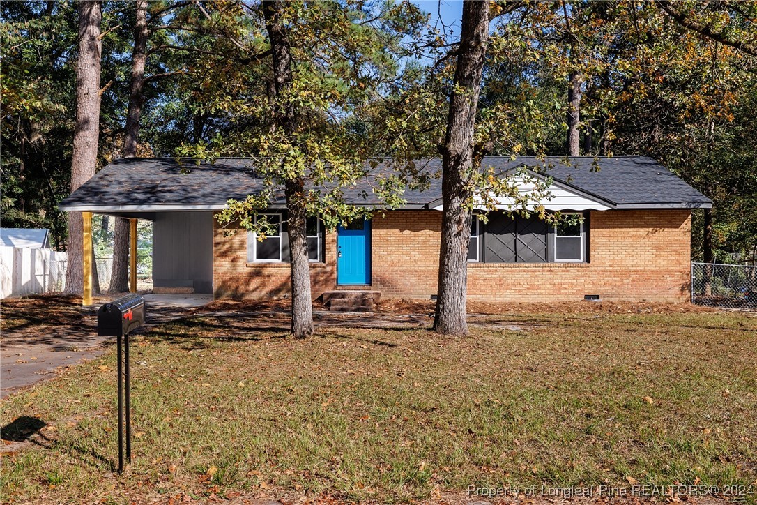 a house with trees in front of it