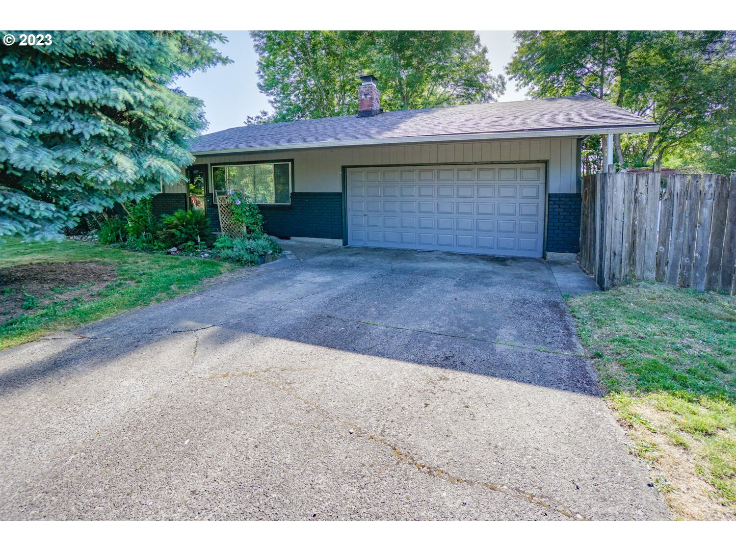 a view of outdoor space yard and garage