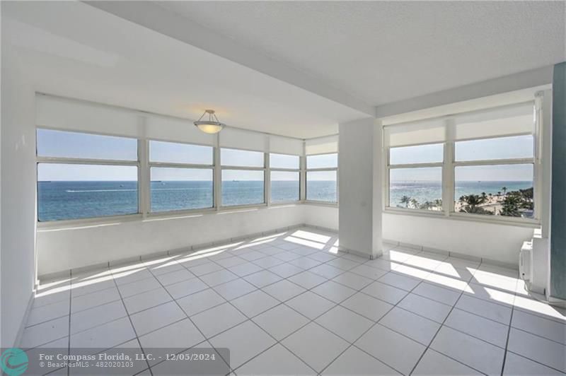 a view of an empty room and window