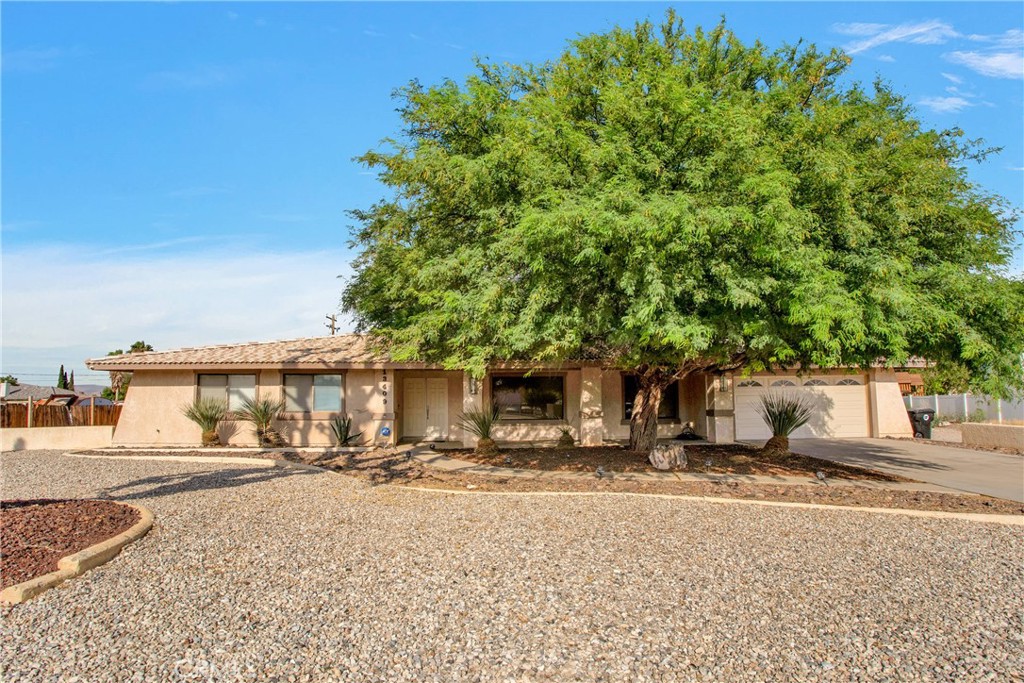 a house with trees in front of it