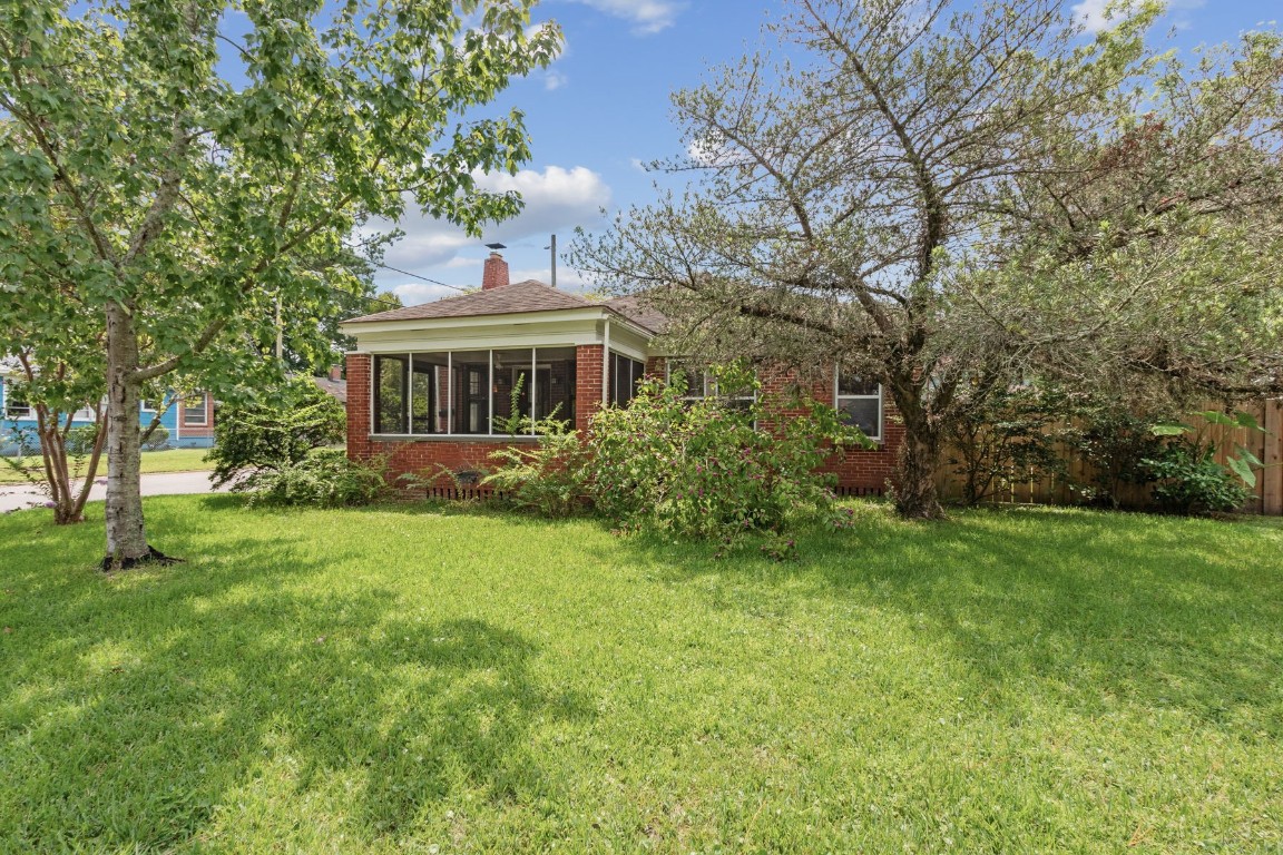 a house view with a garden space